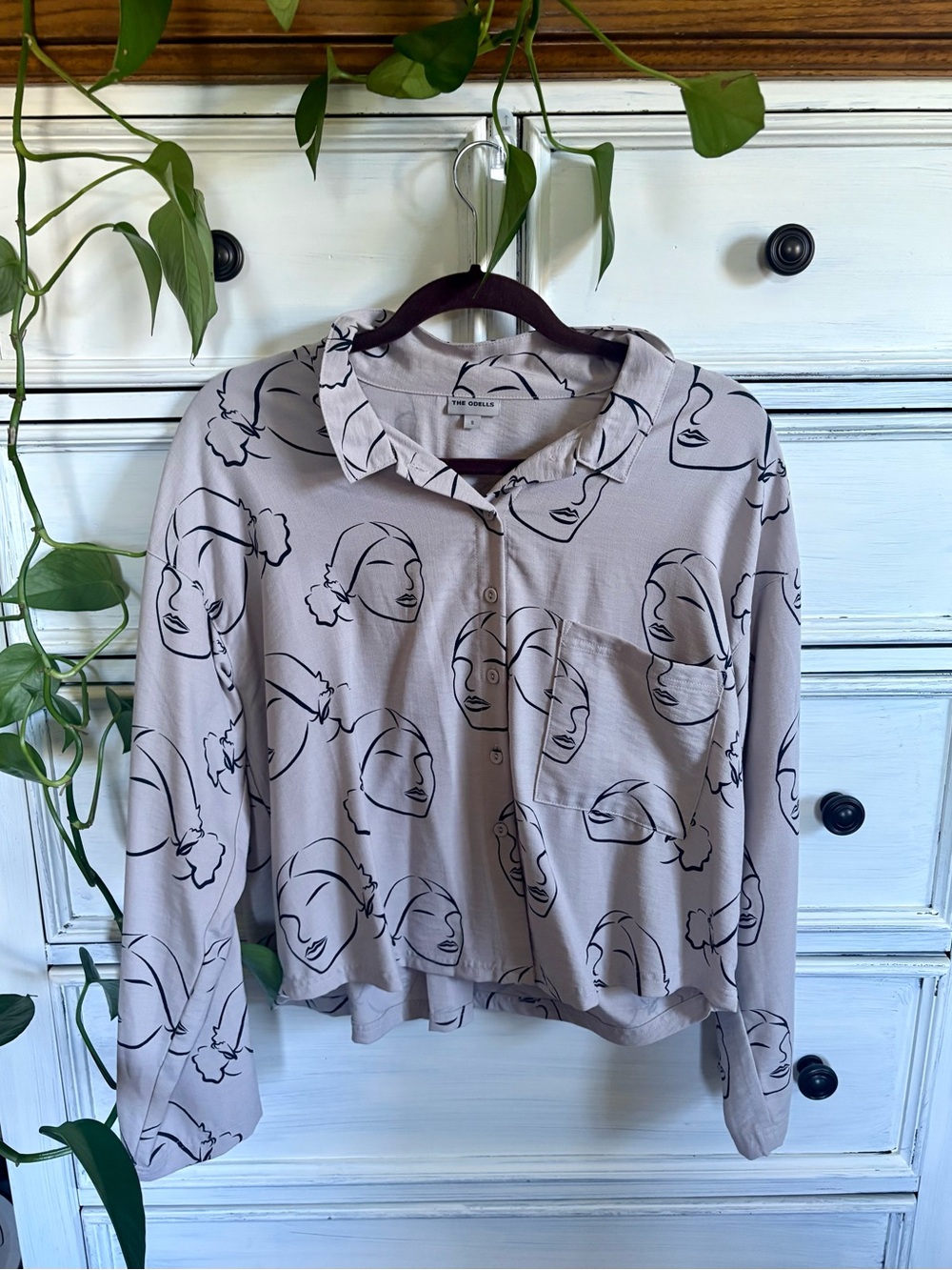 The Odells Abstract Face Print Cropped Button-Up Blouse | Artsy Minimalist Top